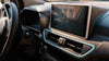 A close up of the Bluetooth entertainment system and full Air Conditioning and Heating system in the Wink Mark3